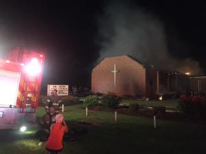 Greeley Church smolders, after God's smiting